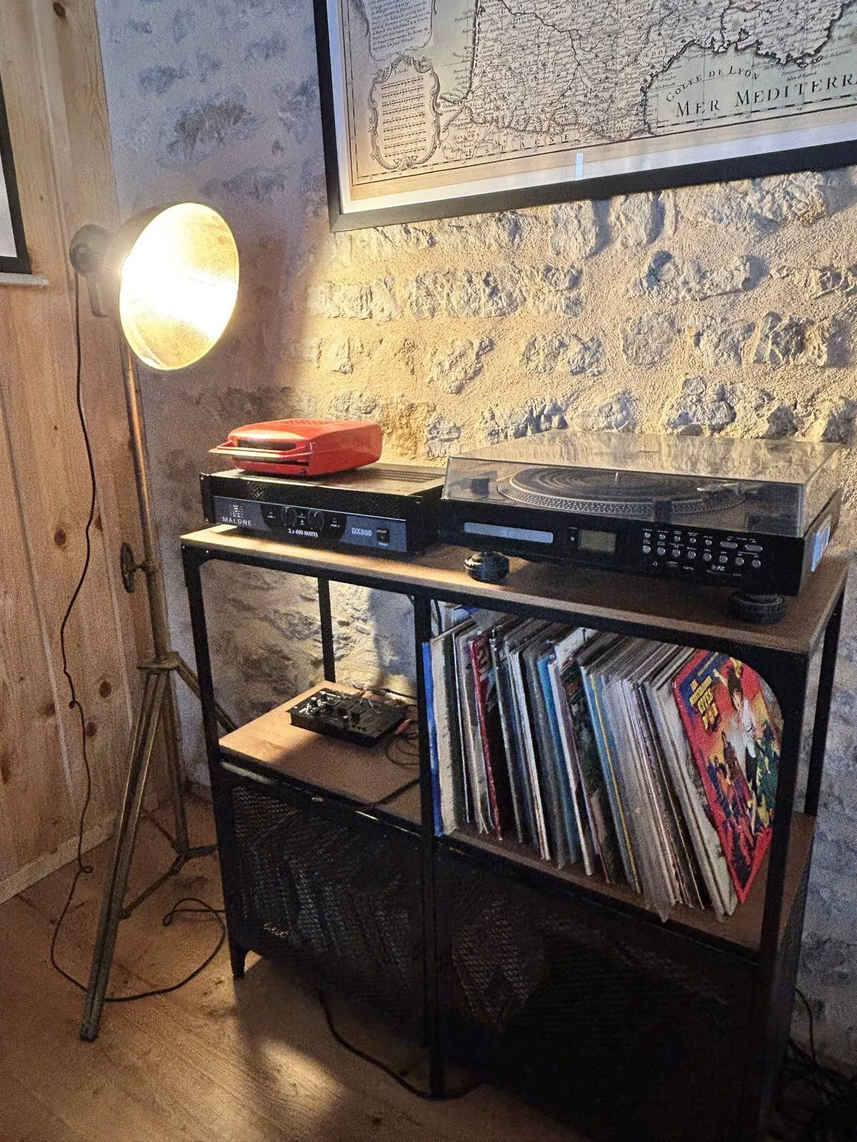 Bar area with stools and wine cellar