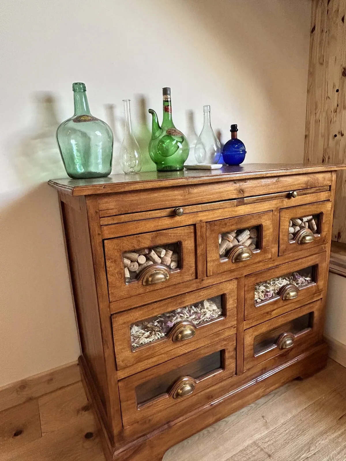Antique chest of drawers with glass carafes