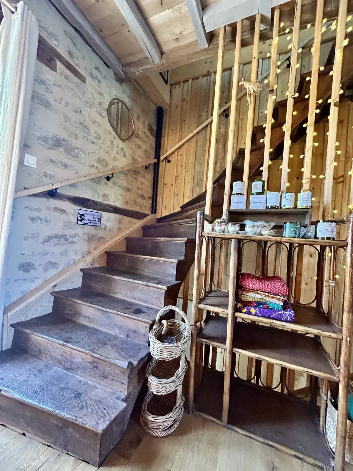 Wooden staircase with wine bottle display