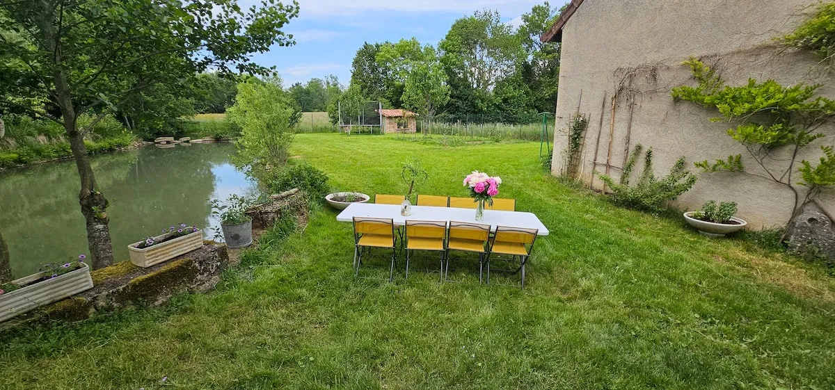 Pond with a picnic table at the water’s edge