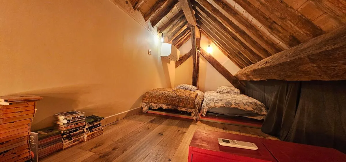 Mezzanine under the eaves with two single beds